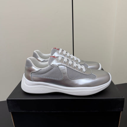 PRADA 26S SNEAKERS IN SILVER CALFSKIN AND WHITE MESH