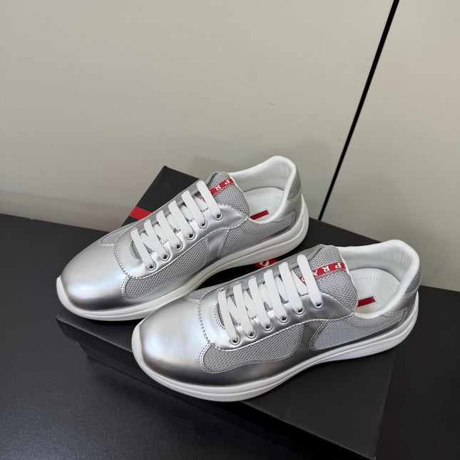 PRADA 26S SNEAKERS IN SILVER CALFSKIN AND WHITE MESH