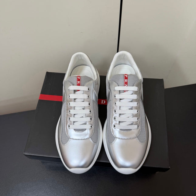 PRADA 26S SNEAKERS IN SILVER CALFSKIN AND WHITE MESH
