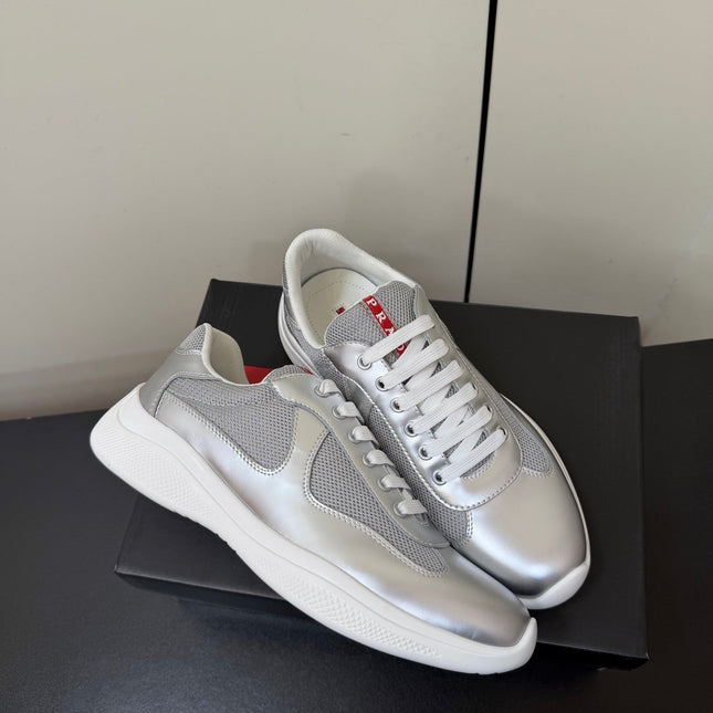 PRADA 26S SNEAKERS IN SILVER CALFSKIN AND WHITE MESH