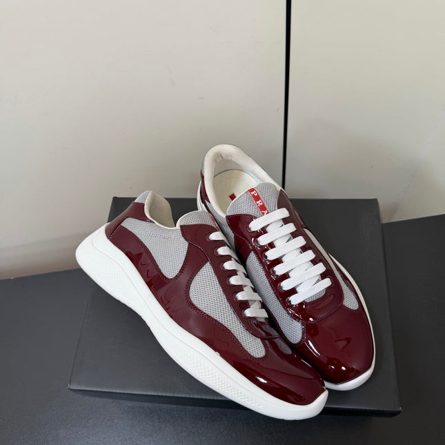 PRADA 26S SNEAKERS IN BURGUNDY RED PATENT CALFSKIN AND WHITE MESH