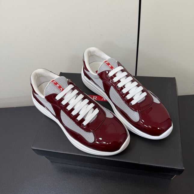 PRADA 26S SNEAKERS IN BURGUNDY RED PATENT CALFSKIN AND WHITE MESH