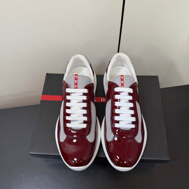 PRADA 26S SNEAKERS IN BURGUNDY RED PATENT CALFSKIN AND WHITE MESH