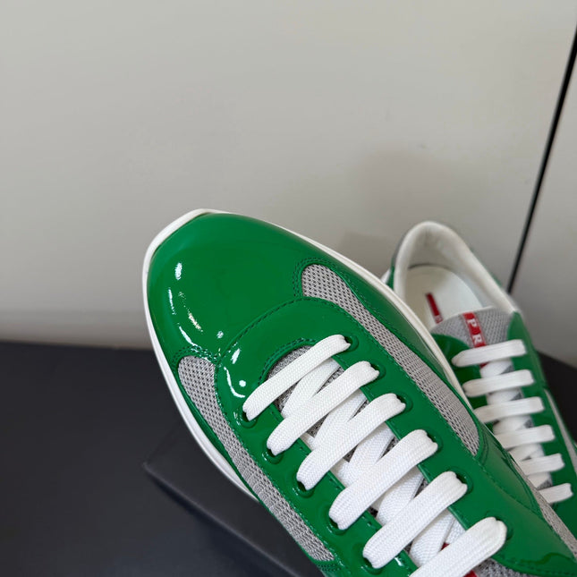 PRADA 26S SNEAKERS IN GREEN PATENT CALFSKIN AND WHITE MESH