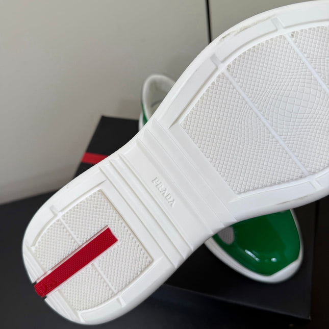 PRADA 26S SNEAKERS IN GREEN PATENT CALFSKIN AND WHITE MESH