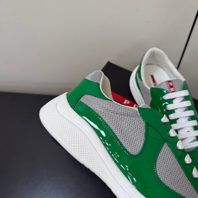 PRADA 26S SNEAKERS IN GREEN PATENT CALFSKIN AND WHITE MESH