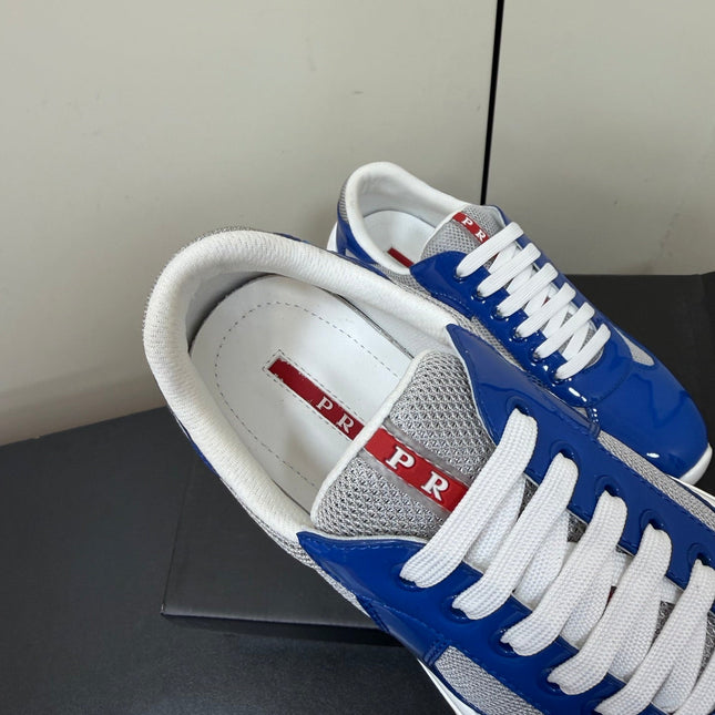 PRADA 26S SNEAKERS IN DARK BLUE PATENT CALFSKIN AND WHITE MESH