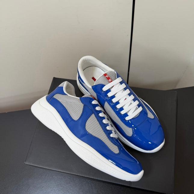 PRADA 26S SNEAKERS IN DARK BLUE PATENT CALFSKIN AND WHITE MESH