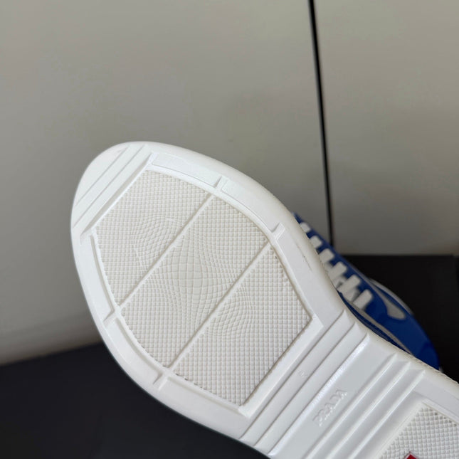 PRADA 26S SNEAKERS IN DARK BLUE PATENT CALFSKIN AND WHITE MESH