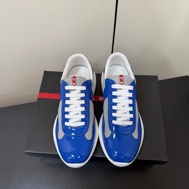 PRADA 26S SNEAKERS IN DARK BLUE PATENT CALFSKIN AND WHITE MESH