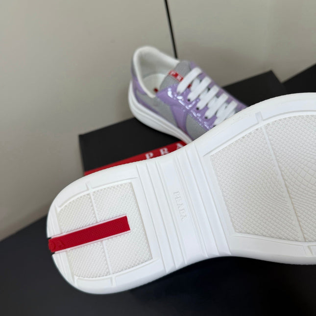 PRADA 26S SNEAKERS IN LIGHT PLUM PATENT CALFSKIN AND WHITE MESH
