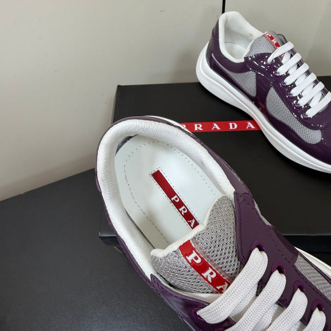 PRADA 26S SNEAKERS IN PLUM PURPLE PATENT CALFSKIN AND WHITE MESH