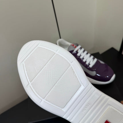 PRADA 26S SNEAKERS IN PLUM PURPLE PATENT CALFSKIN AND WHITE MESH