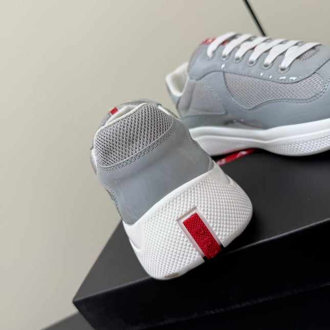 PRADA 26S SNEAKERS IN LIGHT GRAY PATENT CALFSKIN AND WHITE MESH