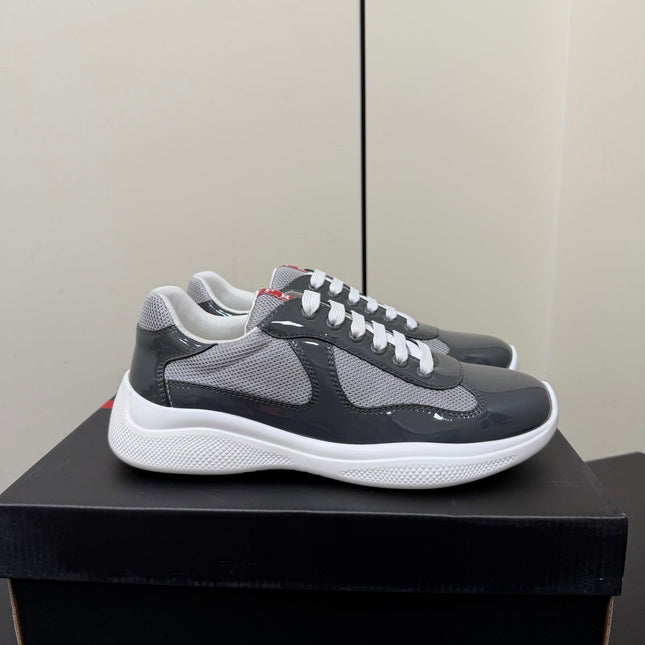 PRADA 26S SNEAKERS IN GRAY PATENT CALFSKIN AND WHITE MESH