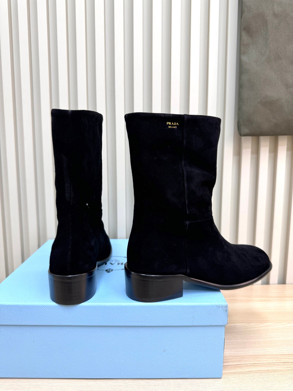 PRADA 25S LOW-CUT BOOTS IN BLACK SUEDE