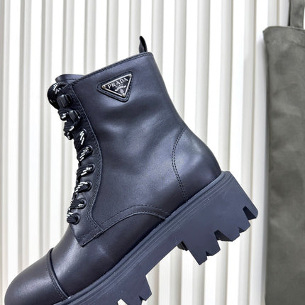 PRADA 25S MONOLITH BOOTS IN BLACK CALFSKIN