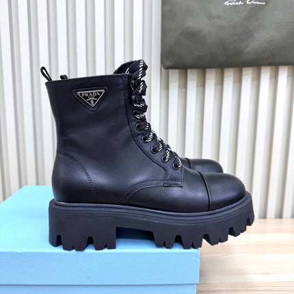 PRADA 25S MONOLITH BOOTS IN BLACK CALFSKIN