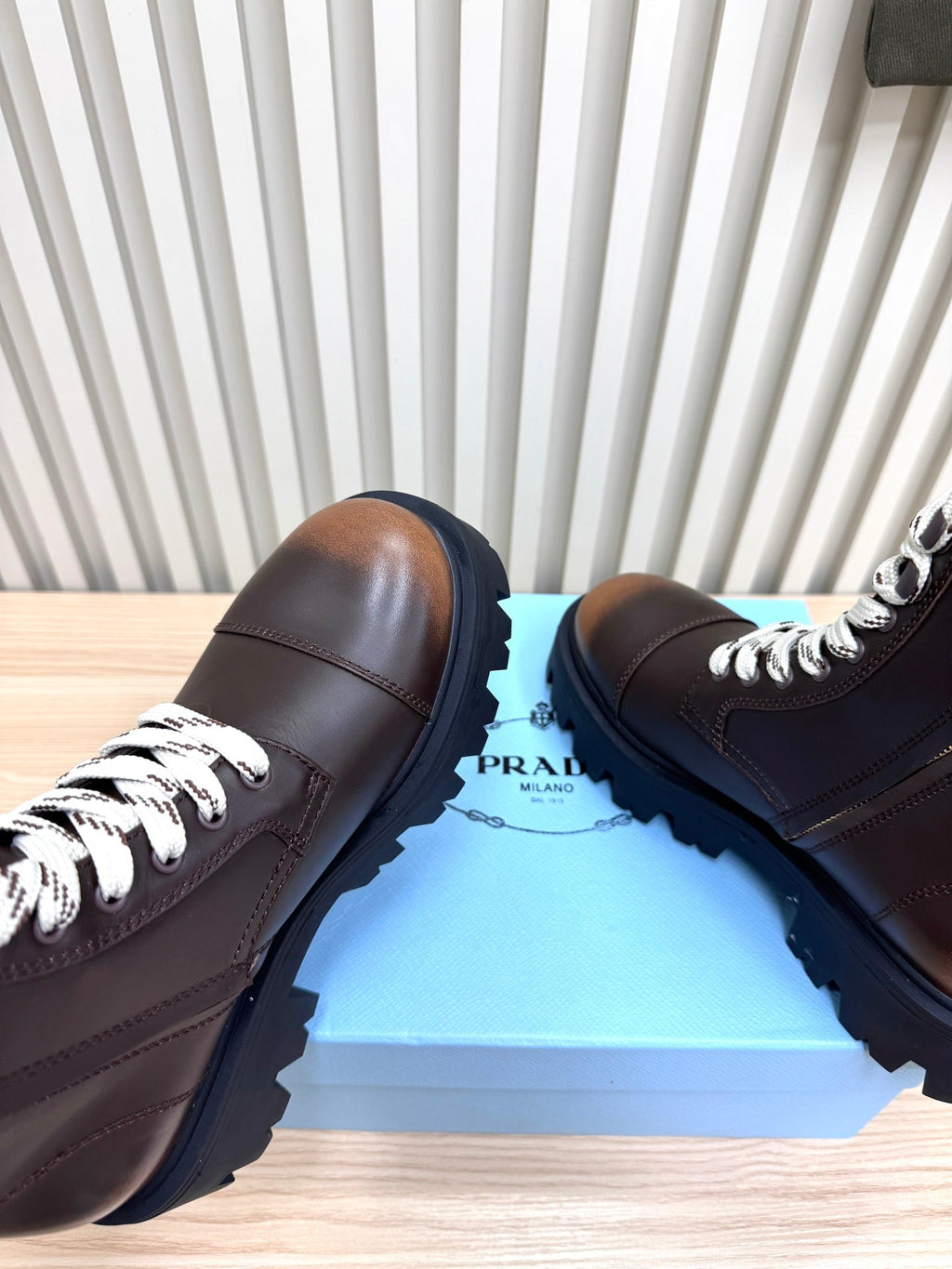 PRADA 25S MONOLITH BOOTS IN DARK BROWN CALFSKIN