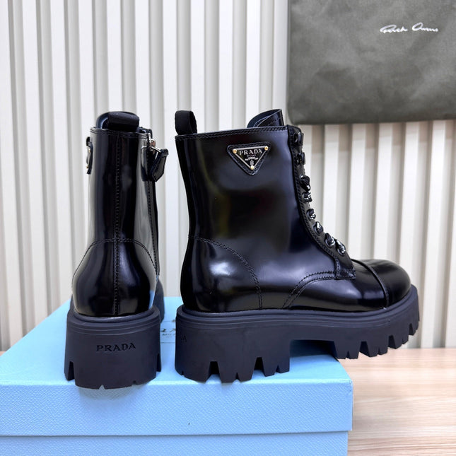 PRADA 25S MONOLITH BOOTS IN BLACK GLOSSY CALFSKIN