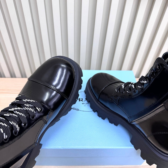 PRADA 25S MONOLITH BOOTS IN BLACK GLOSSY CALFSKIN