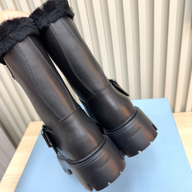 PRADA 25S MARTIN BOOTS IN BLACK CALFSKIN FUR-LINED