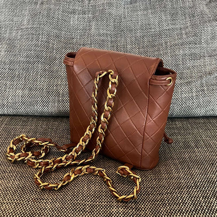 CHANEL 26S BACKPACK WITH FRONT POCKET 21 IN BROWN QUILTED LAMBSKIN GOLD HARDWARE