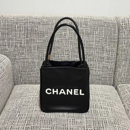CHANEL 26S LOGO SHOPPING TOTE BAG 25 IN BLACK AND WHITE CALFSKIN GOLD HARDWARE