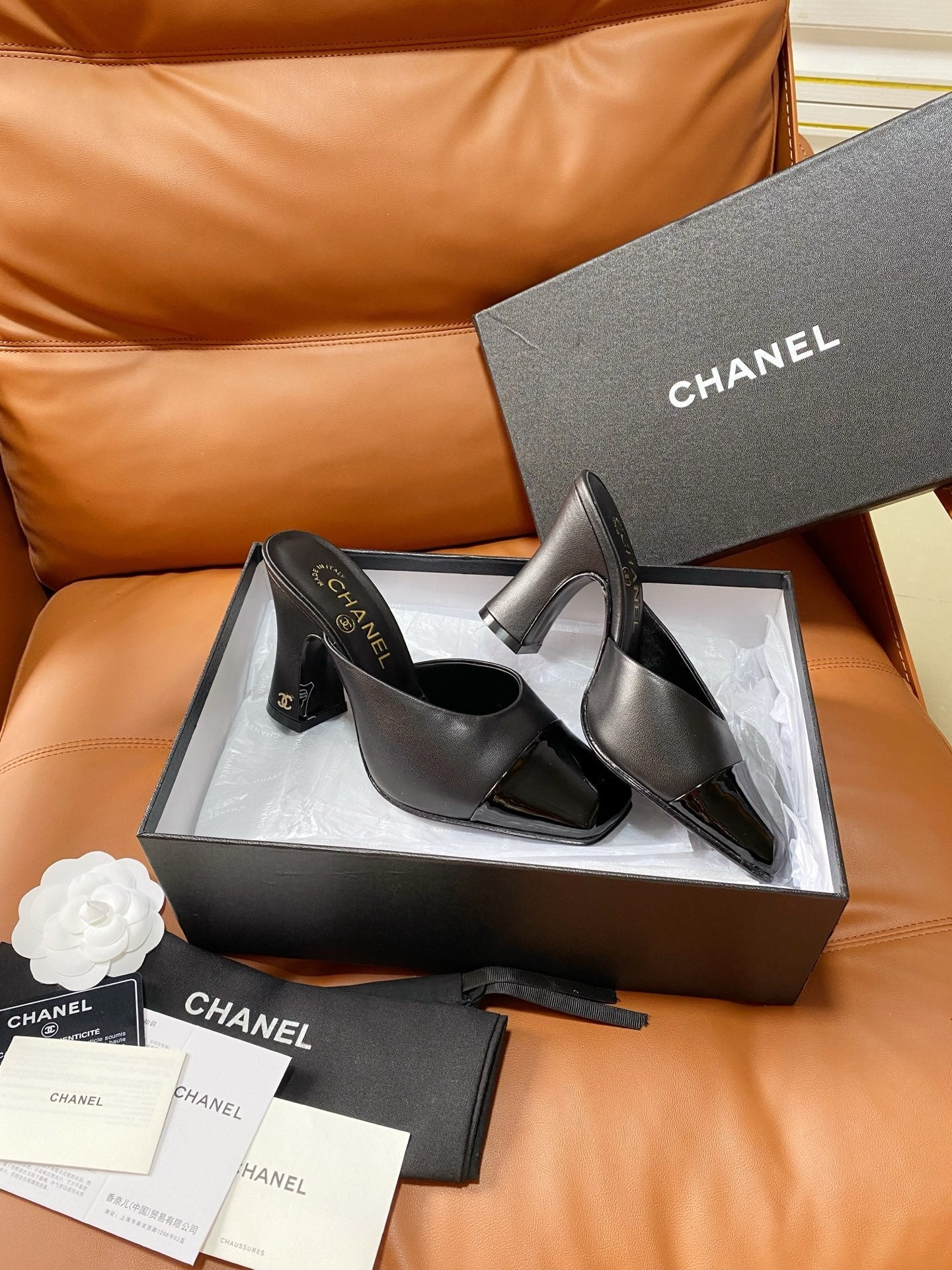 CHANEL 26S HIGH-HEEL MULES 90 MM IN BLACK LAMBSKIN