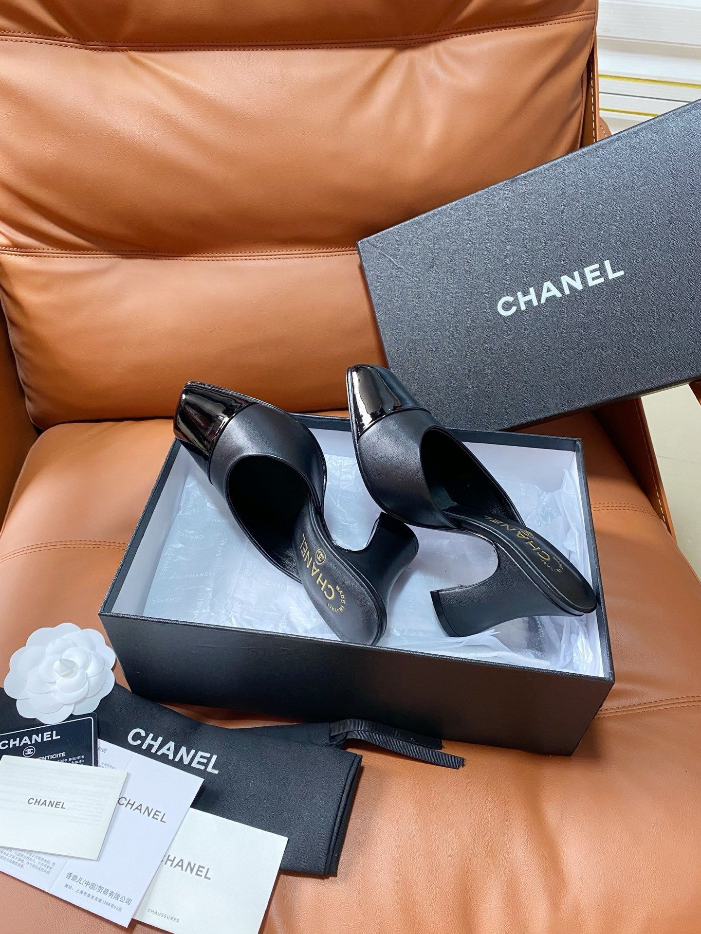 CHANEL 26S HIGH-HEEL MULES 90 MM IN BLACK LAMBSKIN