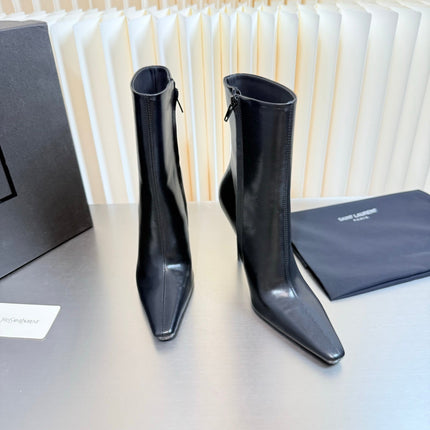 YSL 26S POINTED-TOE HEELED BOOTS 105 MM IN BLACK SHINY CALFSKIN