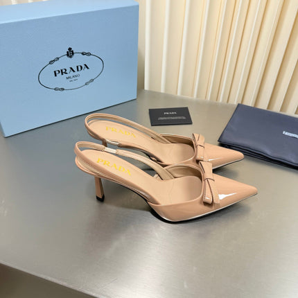 PRADA 26S POINTED-TOE SLINGBACK PUMPS IN BEIGE PATENT CALFSKIN WITH BOW