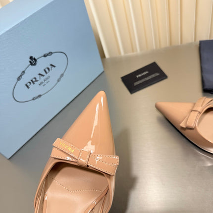 PRADA 26S POINTED-TOE SLINGBACK PUMPS IN BEIGE PATENT CALFSKIN WITH BOW