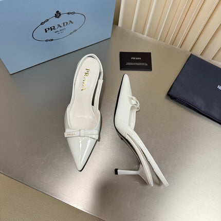 PRADA 26S POINTED-TOE SLINGBACK PUMPS IN WHITE PATENT CALFSKIN WITH BOW