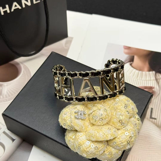 CHANEL 26S CHANEL LOGO OPEN CUFF LEATHER CHAIN BRACELET IN GOLD METAL 630836