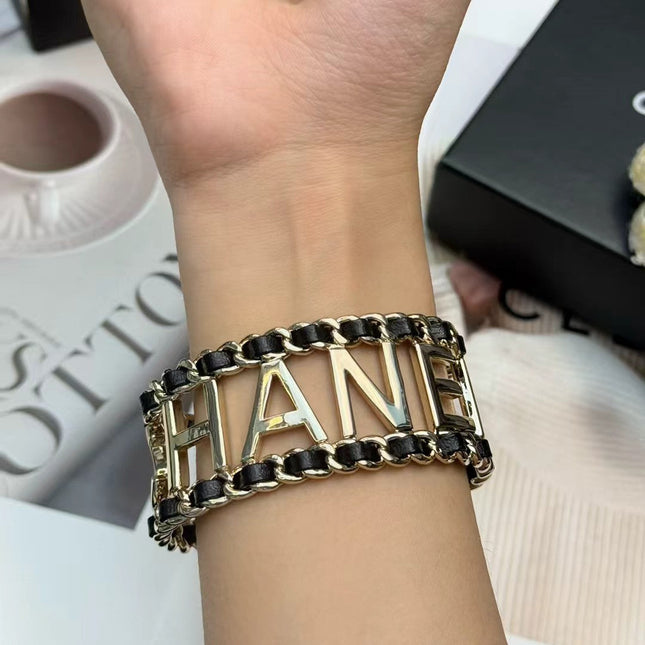CHANEL 26S CHANEL LOGO OPEN CUFF LEATHER CHAIN BRACELET IN GOLD METAL 630836