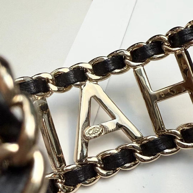 CHANEL 26S CHANEL LOGO OPEN CUFF LEATHER CHAIN BRACELET IN GOLD METAL 630836