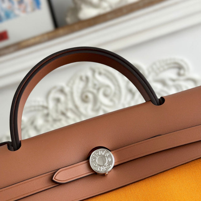 ZIP CABINE 31 BAG IN APRICOT ORANGE CANVAS AND BRONZE BROWN CALFSKIN