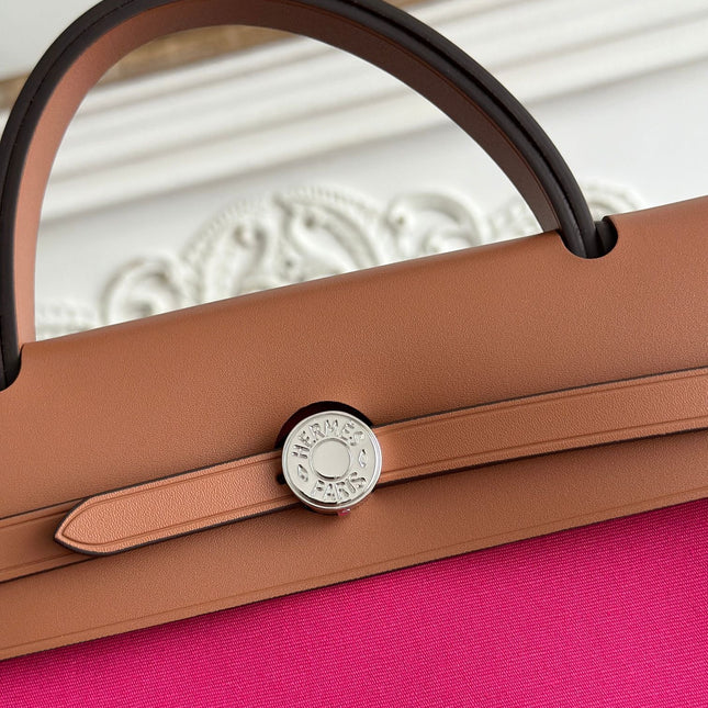 ZIP CABINE 31 BAG IN FUCHSIA PINK CANVAS AND BRONZE BROWN CALFSKIN