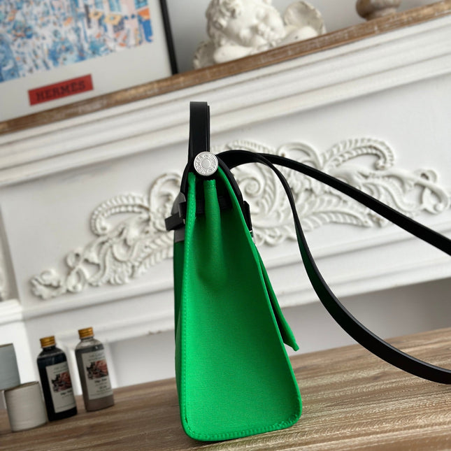 ZIP CABINE 31 BAG IN EMERALD GREEN CANVAS AND BLACK CALFSKIN