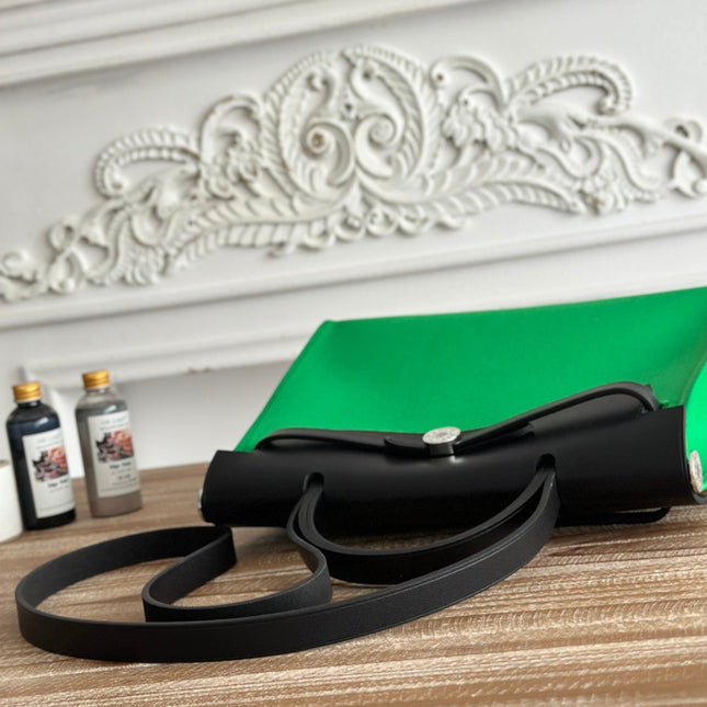 ZIP CABINE 31 BAG IN EMERALD GREEN CANVAS AND BLACK CALFSKIN
