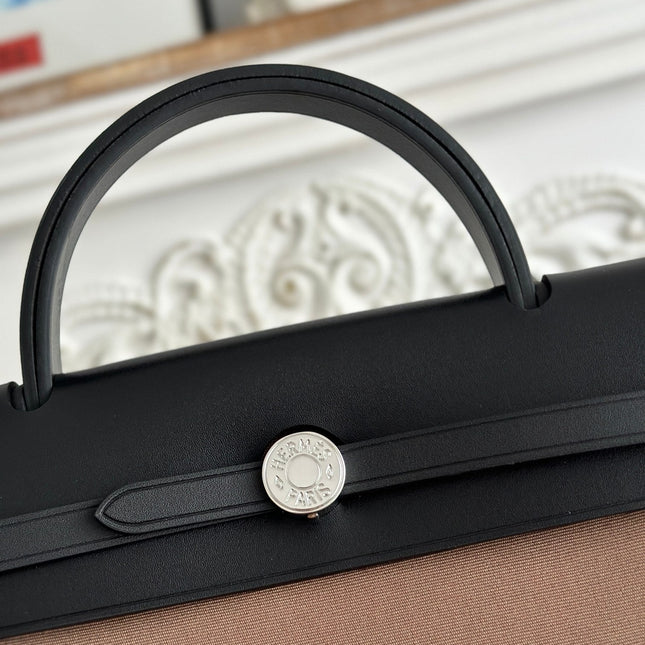 ZIP CABINE 31 BAG IN CHOCOLATE BROWN CANVAS AND BLACK CALFSKIN