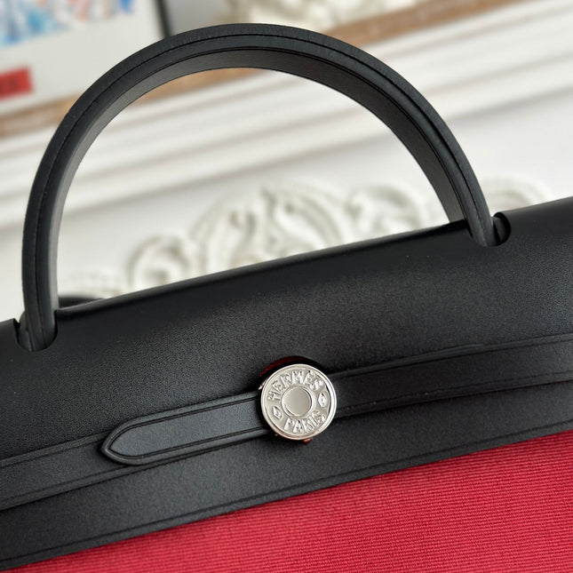 ZIP CABINE 31 BAG IN RUBY RED CANVAS AND BLACK CALFSKIN