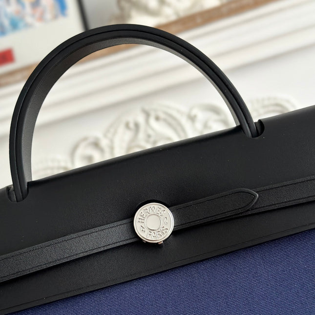 ZIP CABINE 31 BAG IN NAVY BLUE CANVAS AND BLACK CALFSKIN