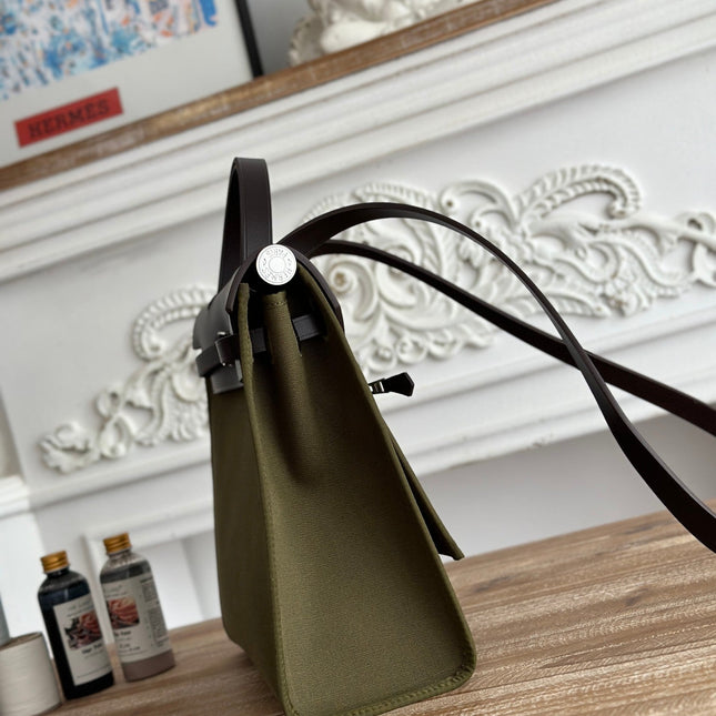 ZIP CABINE 31 BAG IN OLIVE GREEN CANVAS AND BLACK CALFSKIN