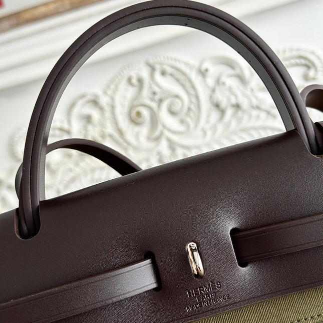 ZIP CABINE 31 BAG IN OLIVE GREEN CANVAS AND BLACK CALFSKIN