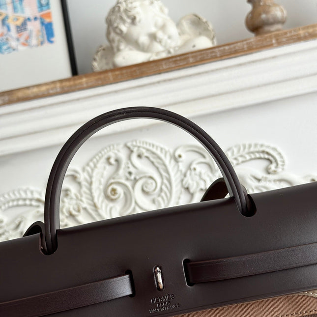 ZIP CABINE 31 BAG IN CHOCOLATE BROWN CANVAS AND BLACK CALFSKIN