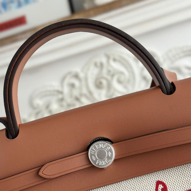 HERBAG ZIP 31 RETOURNE PEGASE POP BAG IN OFF-WHITE MIX RED CANVAS AND HUNTER COWHIDE