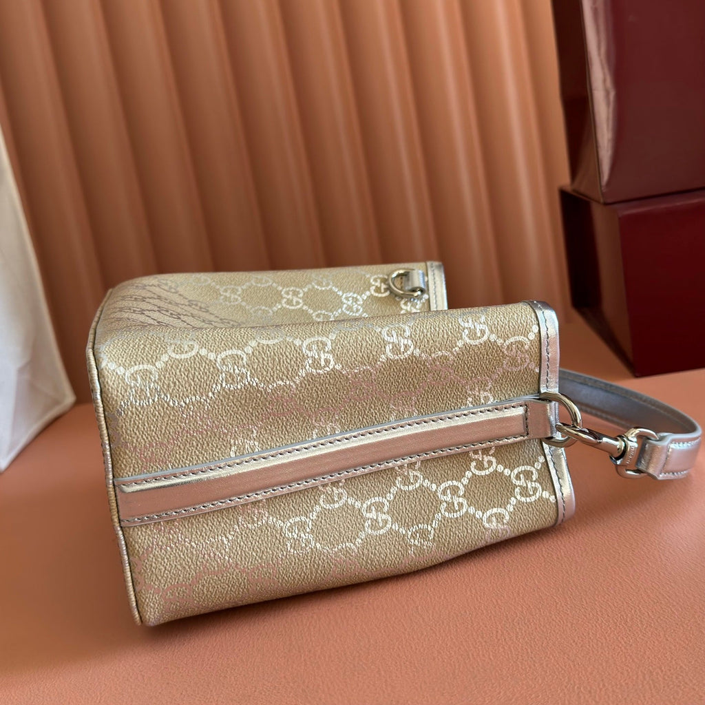 GUCCI 26S GG EMBLEM BUCKET BAG 19 IN BEIGE AND SILVER CANVAS