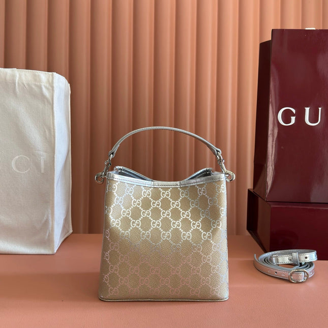 GUCCI 26S GG EMBLEM BUCKET BAG 19 IN BEIGE AND SILVER CANVAS